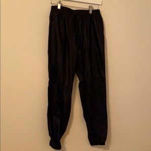 Black faux leather joggers